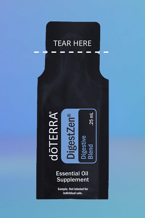 doTERRA DigestZen Digestive Blend .25 mL sample sachet on a blue background with a dashed TEAR HERE line marking where to tear it open. doTERRA DigestZen Essential Oil Sample (.25 mL)