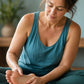 Woman sitting cross-legged, rubbing doTERRA Balance into the sole of her foot. doTERRA Balance Essential Oil Sample (.25 mL)