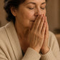 Woman in a cream cardigan inhaling doTERRA Copaiba from her cupped hands in a cozy lamp-lit living room. doTERRA Copaiba Essential Oil Sample (.25 mL)