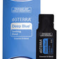 doTERRA Deep Blue Soothing Blend .25 mL black sample sachet standing in front of its blue doTERRA pillow box on a white background. doTERRA Deep Blue Essential Oil Sample (.25 mL)