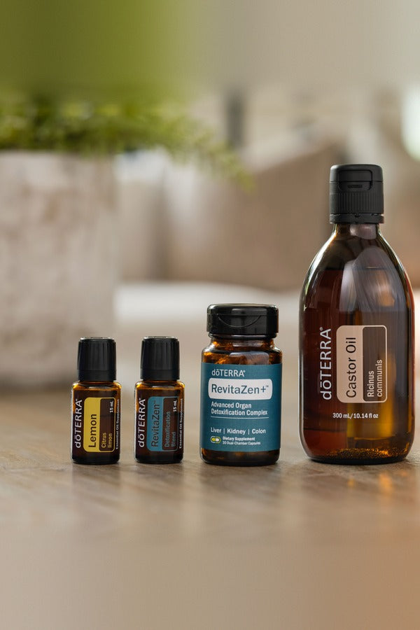 doTERRA Detox Bundle with RevitaZen, RevitaZen+, Lemon and Castor Oil on a kitchen table