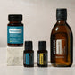 doTERRA Detox Bundle products arranged on a stone block in soft daylight