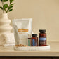 doTERRA Digestive Bundle with Ginger Drops, DigestTab, DigestZen Softgels and Tamer on a bathroom counter