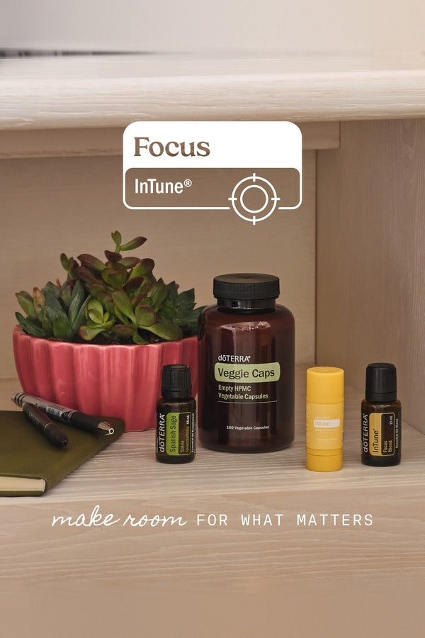 doTERRA Focus Bundle on a desk shelf with a succulent - Make room for what matters