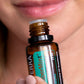 Woman enjoying the invigorating aroma of doTERRA SuperMint essential oil blend