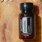 doTERRA Copaiba Softgels bottle on a wooden board