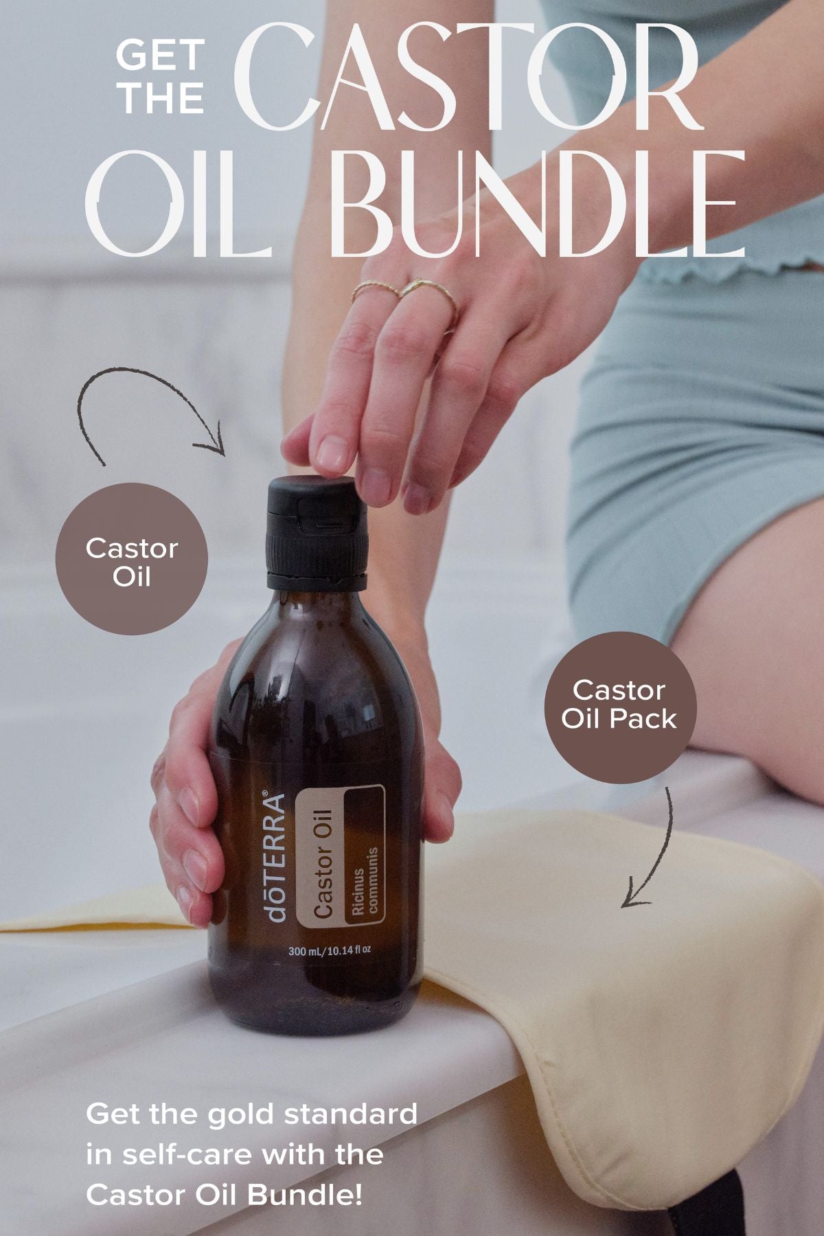 A promotional bundle graphic for doTERRA castor oil, showing a person holding a dark amber bottle labeled doTERRA Castor Oil, with hands and part of the body visible in a spa-like setting. Large text reads 'GET THE doTERRA CASTOR OIL pack' with callouts for 'Castor Oil' and 'Castor Oil Pack'.