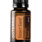 doTERRA Desert Sand essential oil bottle on a white background