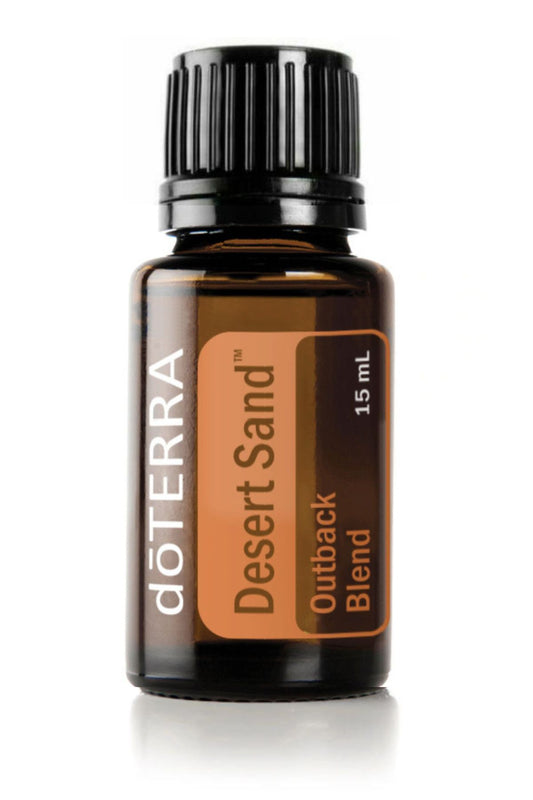 doTERRA Desert Sand essential oil bottle on a white background