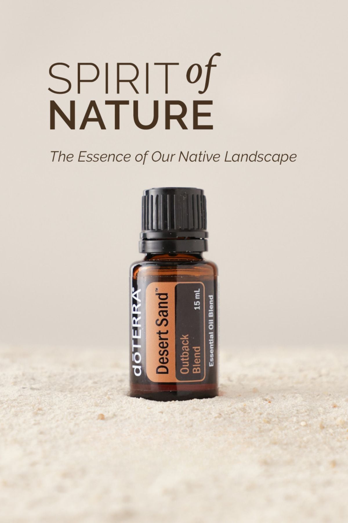 doTERRA Desert Sand essential oil bottle on a sandy background with 'Spirit of Nature' text.