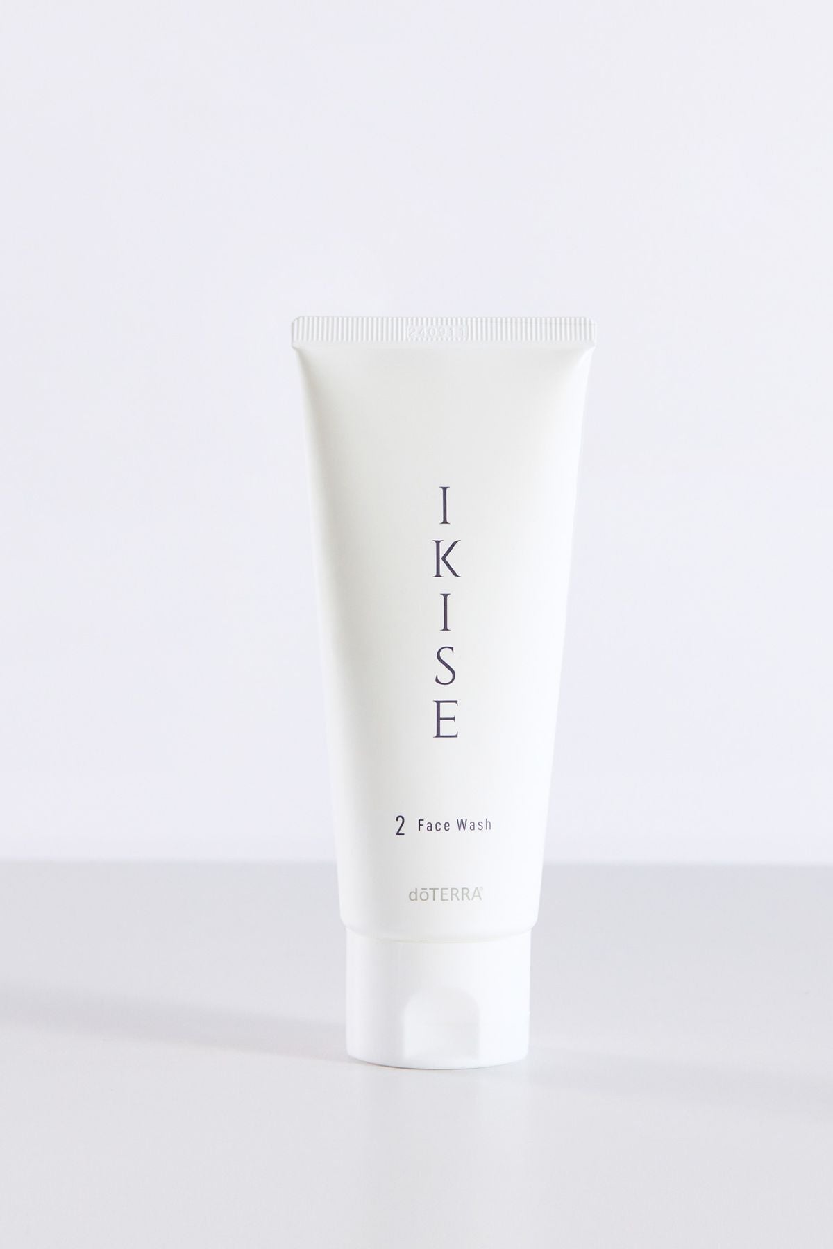 A white plastic squeeze tube of IKISE 2 Face Wash, featuring black vertical lettering, set against a clean white background with a soft shadow.